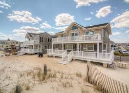 Waterfront home exterior repainted